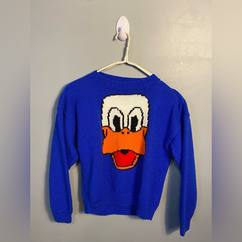 Vibrant Blue Crewneck Sweater with Cartoon Face